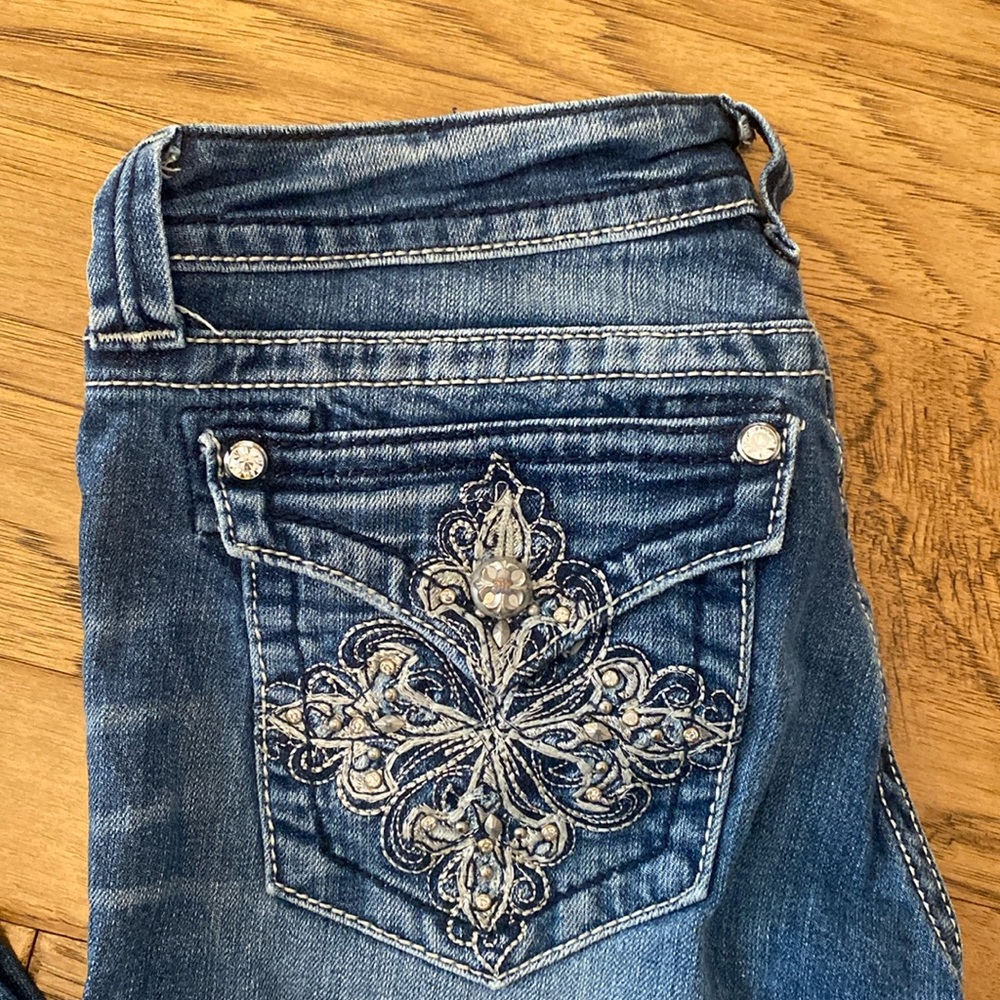 Miss Me mid-rise bootcut jeans. Size 29.